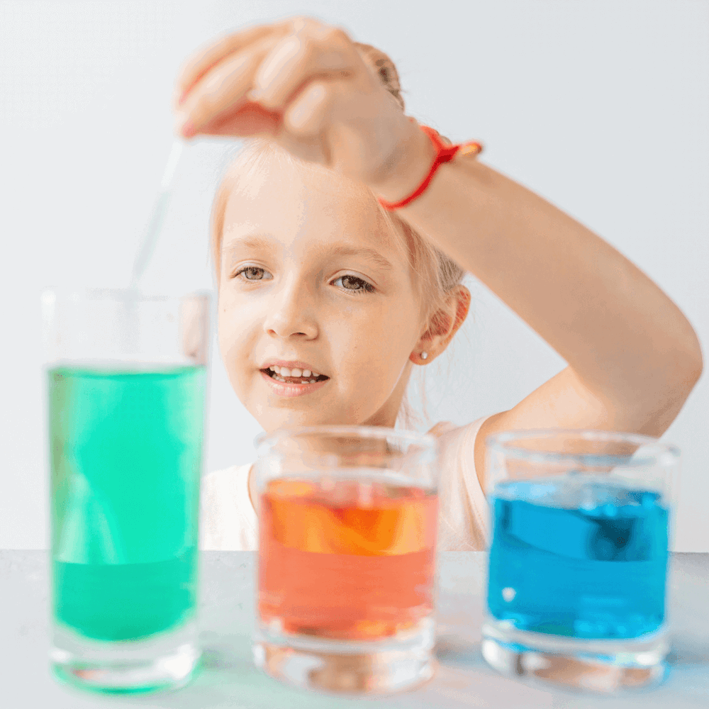 Girl with chemistry bottles