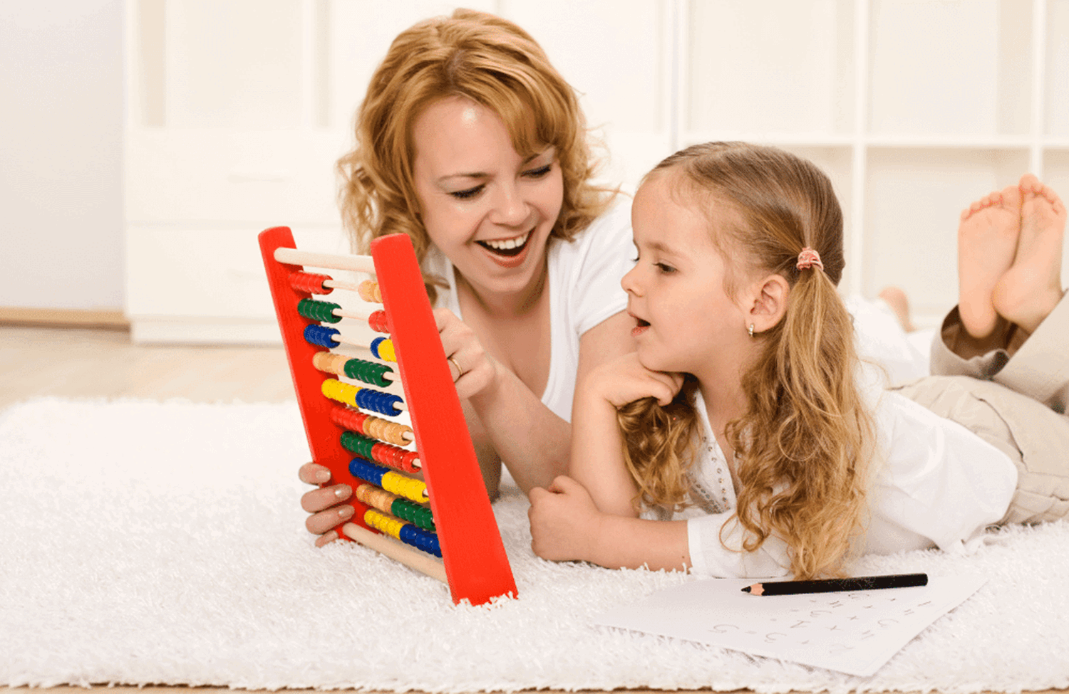 Parent and child with an abacus