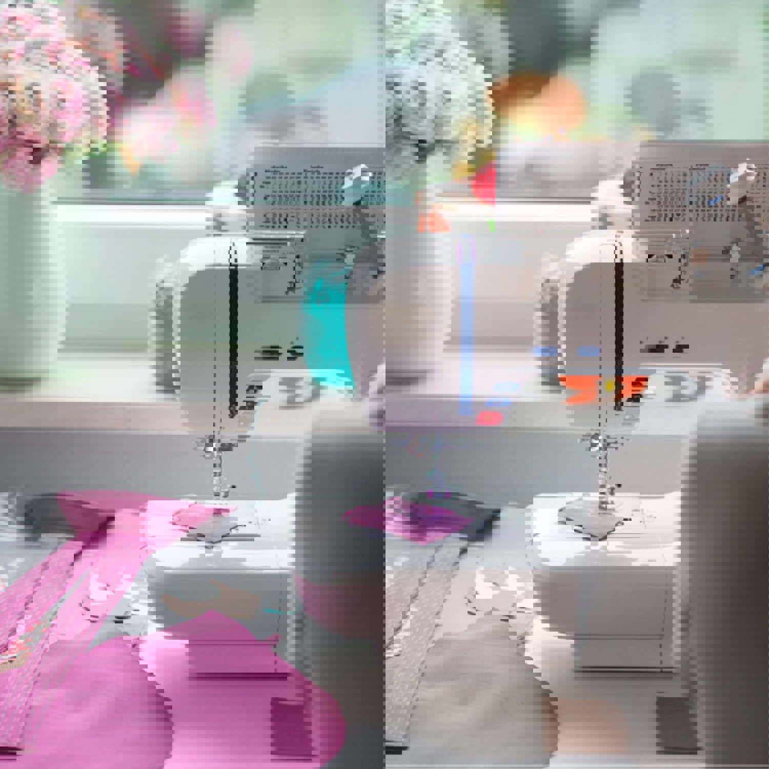 Person sewing at machine
