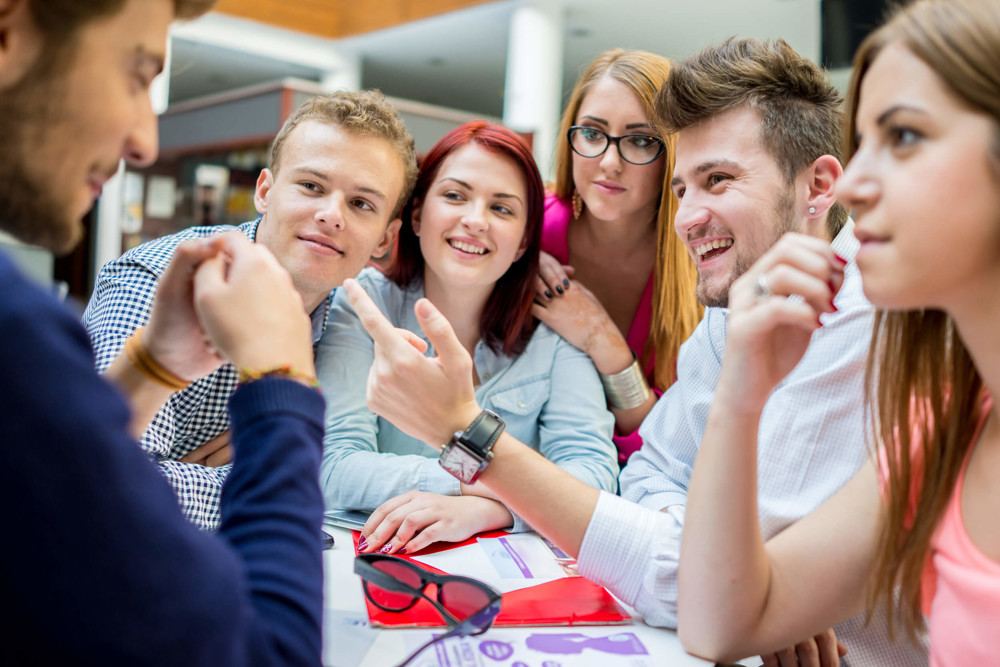 A group of young adults laughing