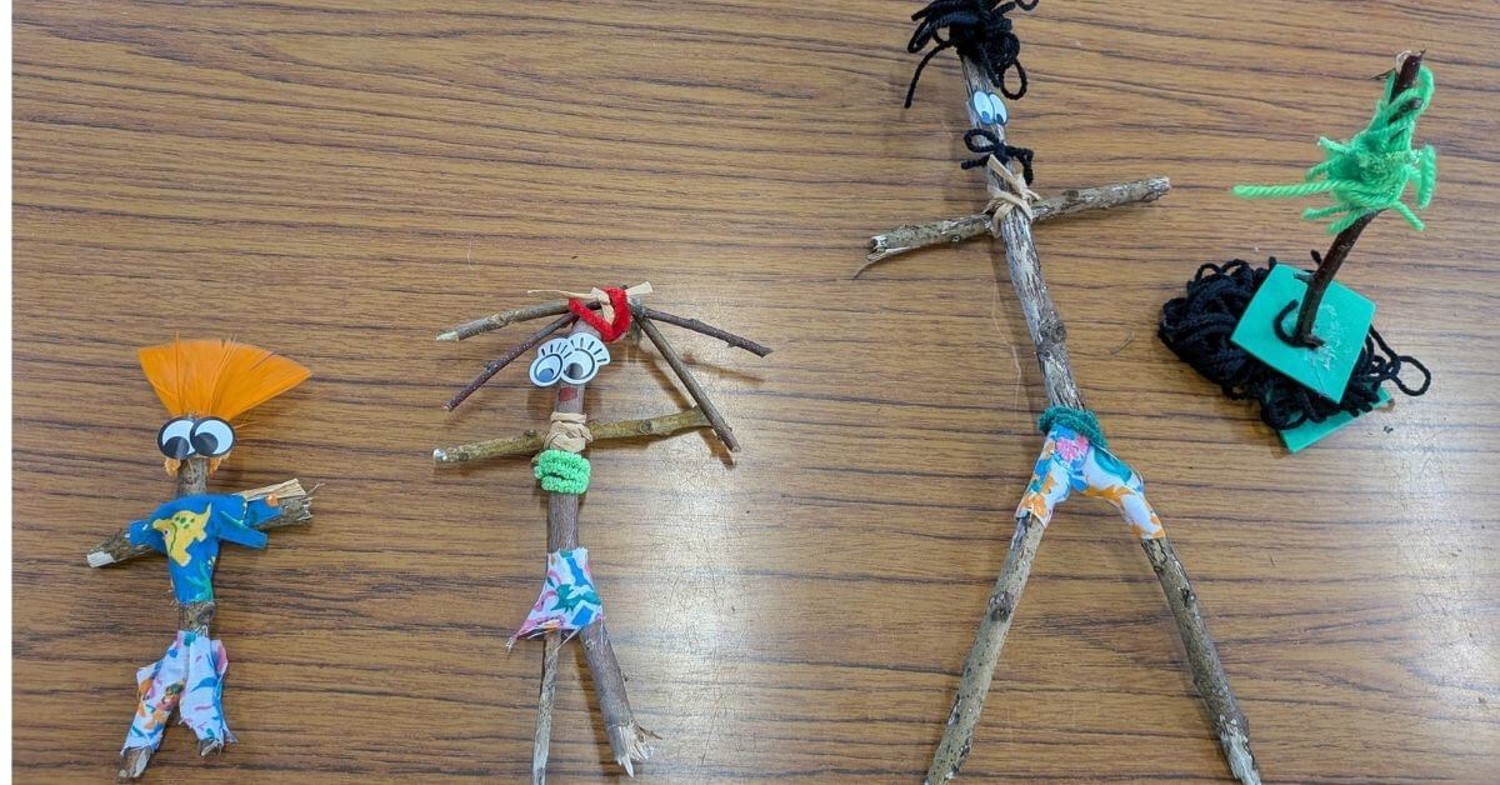 People made from twigs by a child on a family learning course
