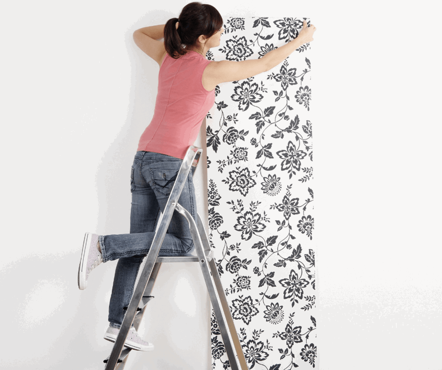 Woman Wallpapering 