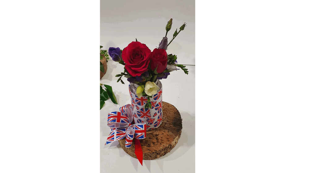 Flowers in jar with union jack flags