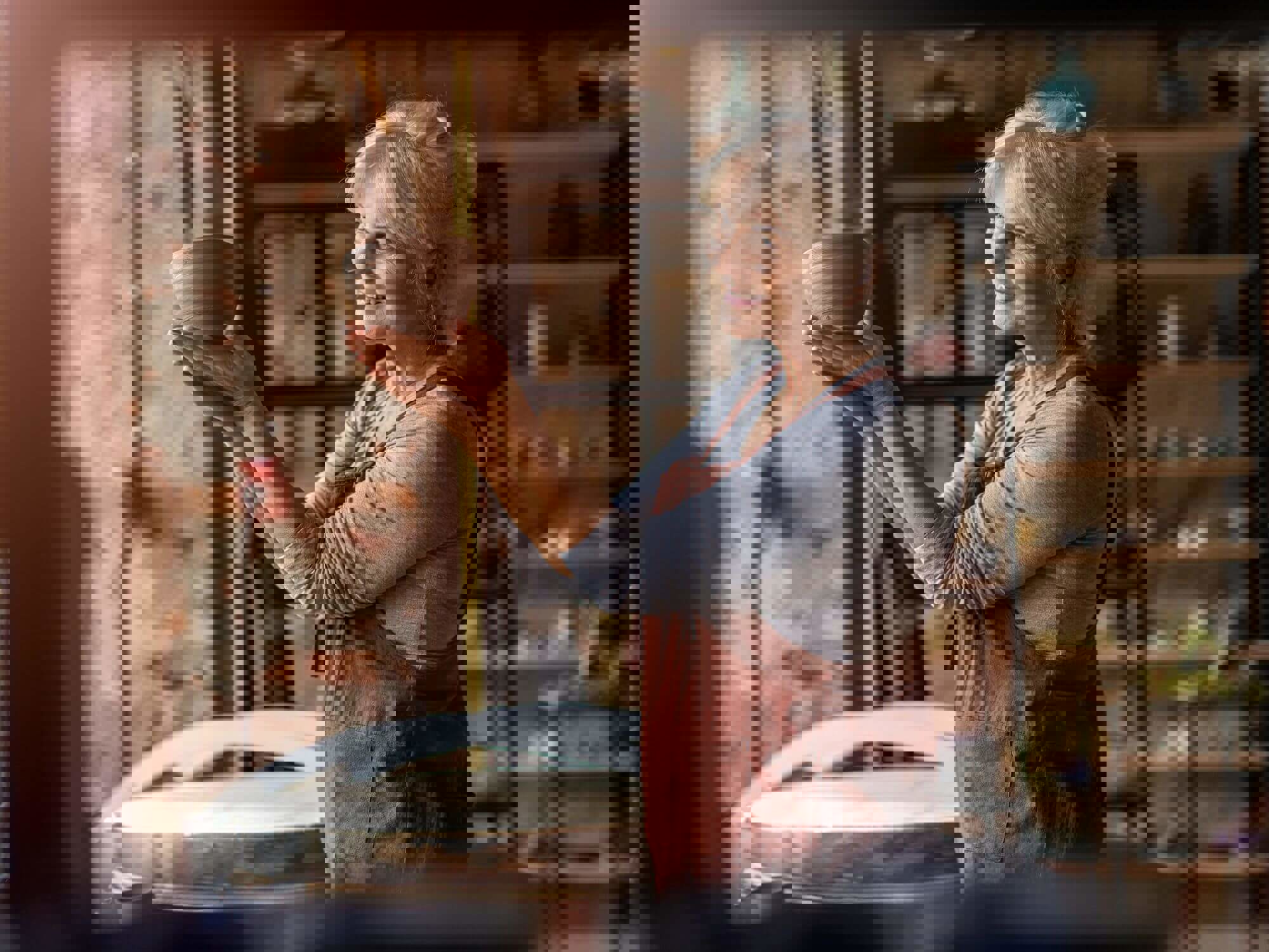 Lady holding up pottery