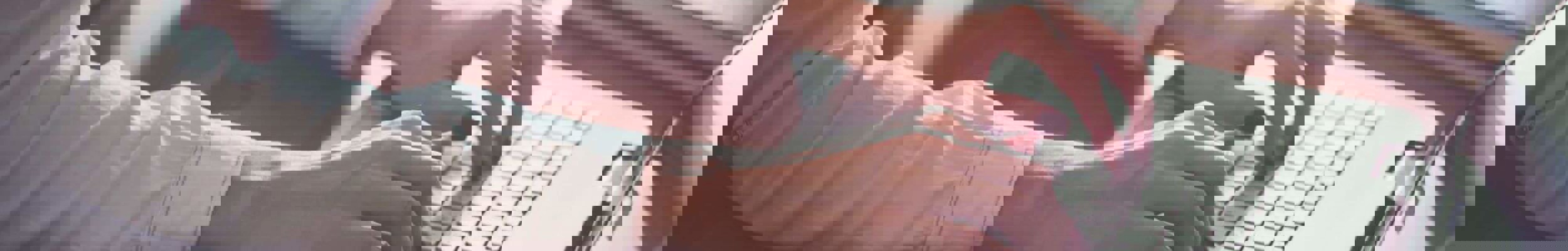 Woman typing on laptop