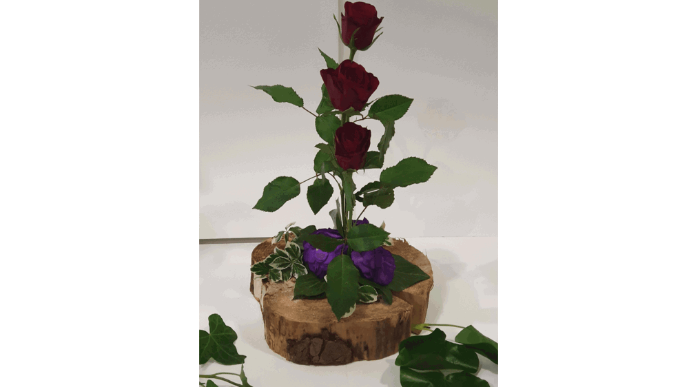 Flowers on wooden base