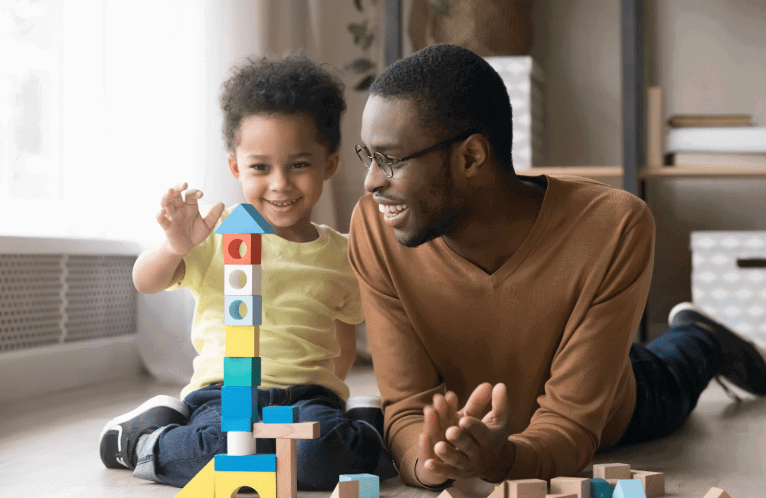 Parent and child using building blocks